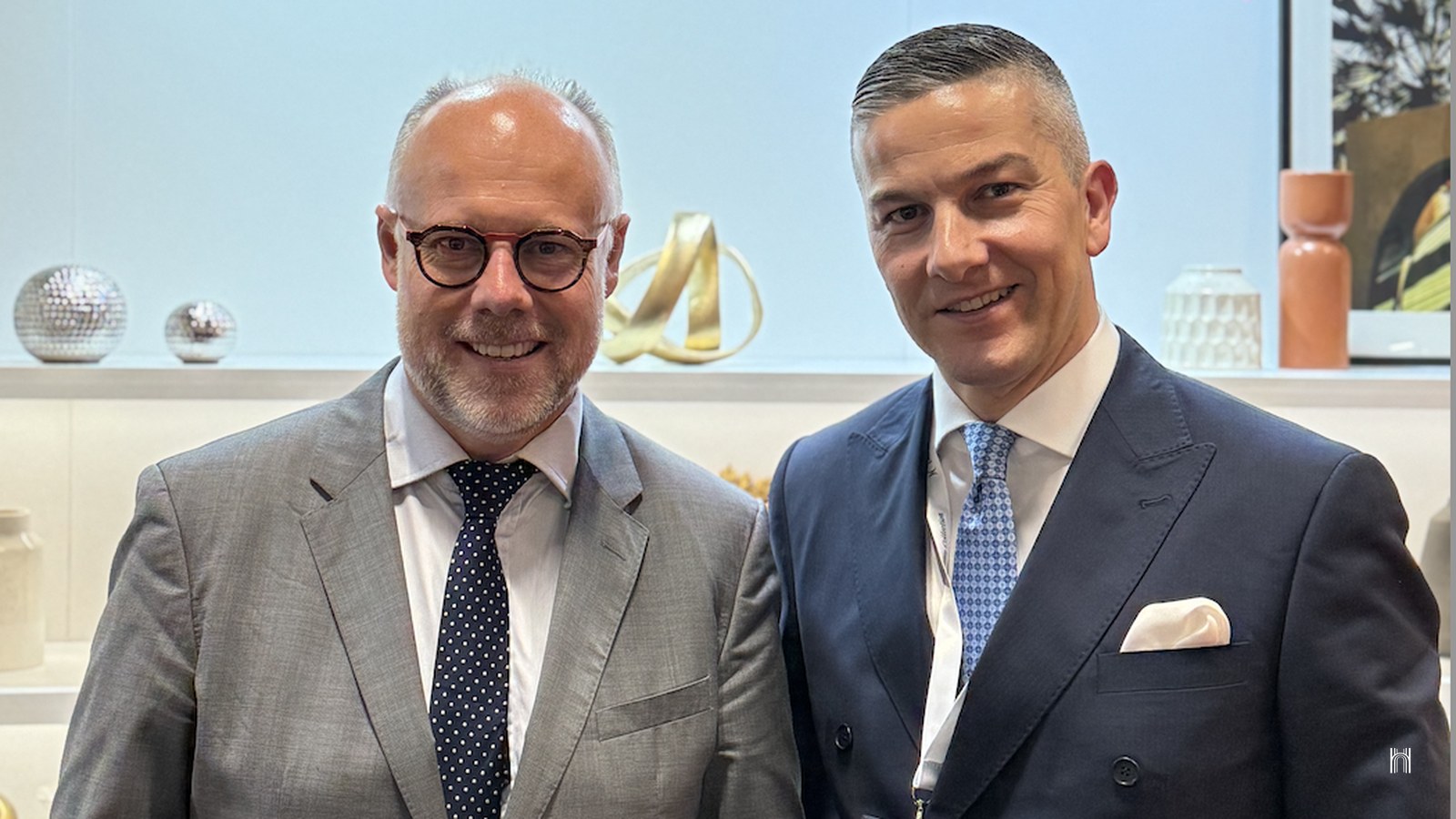 Laurent Delporte and Mirko Cattini, then general manager of Hotel Eden Rome, smiling side by side at ILTM Cannes